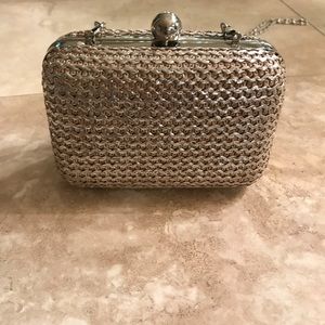 Small metallic bag with chain